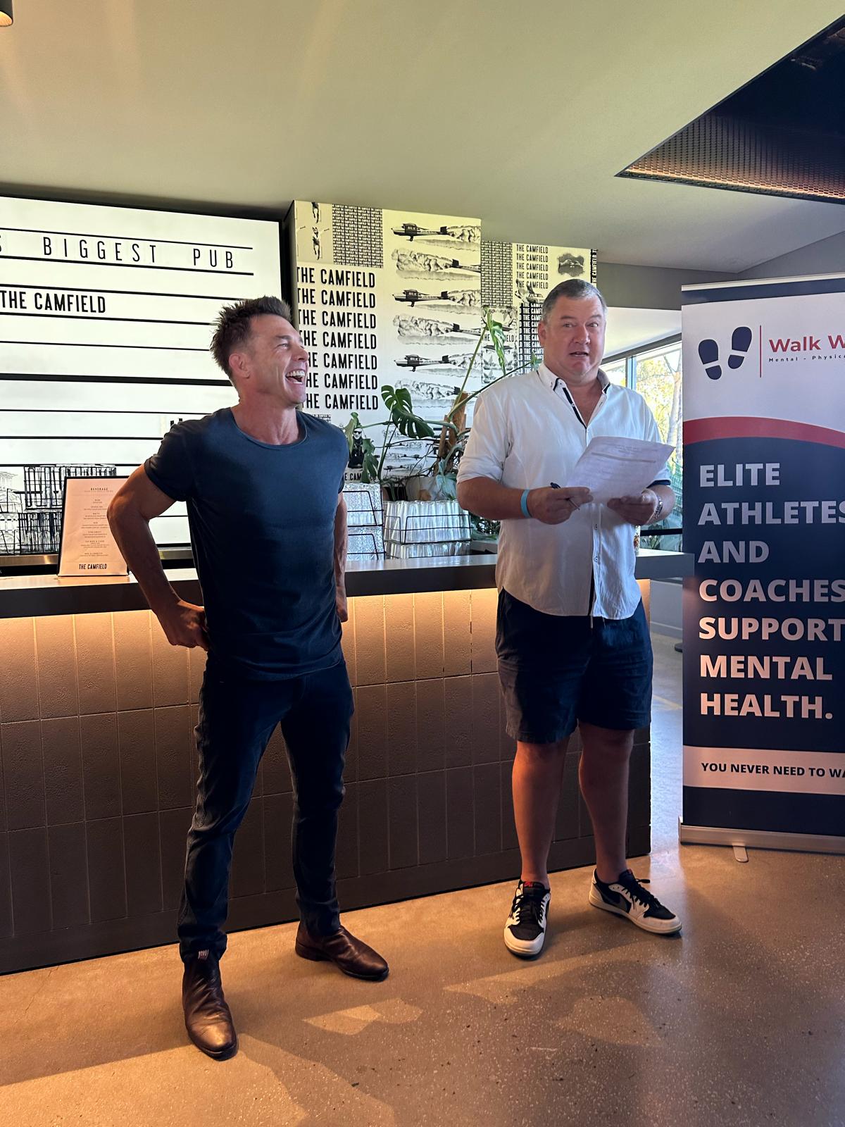 4QTR host with a special guest at a charity event