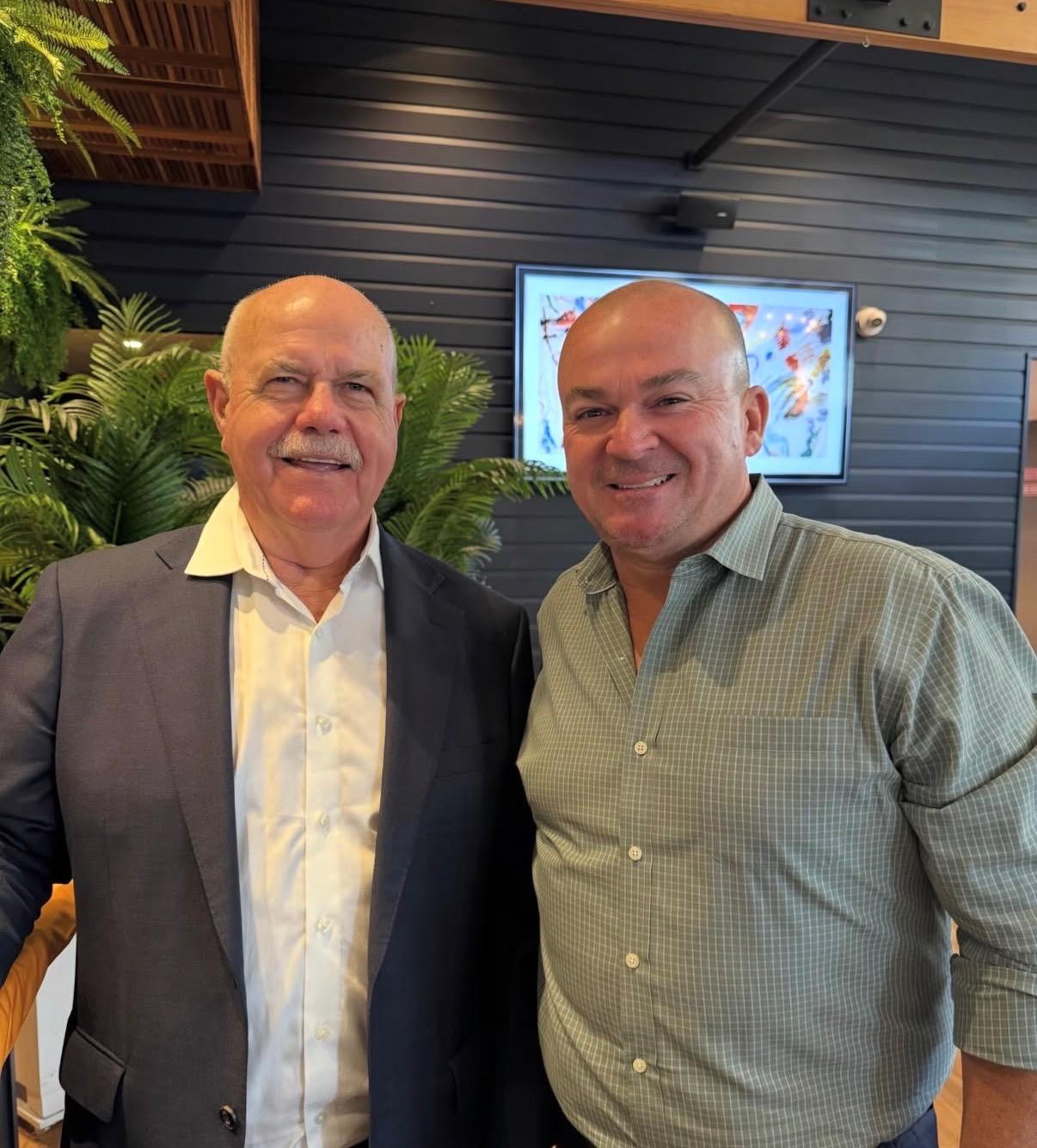 4QTR host with a cricket legend at an event